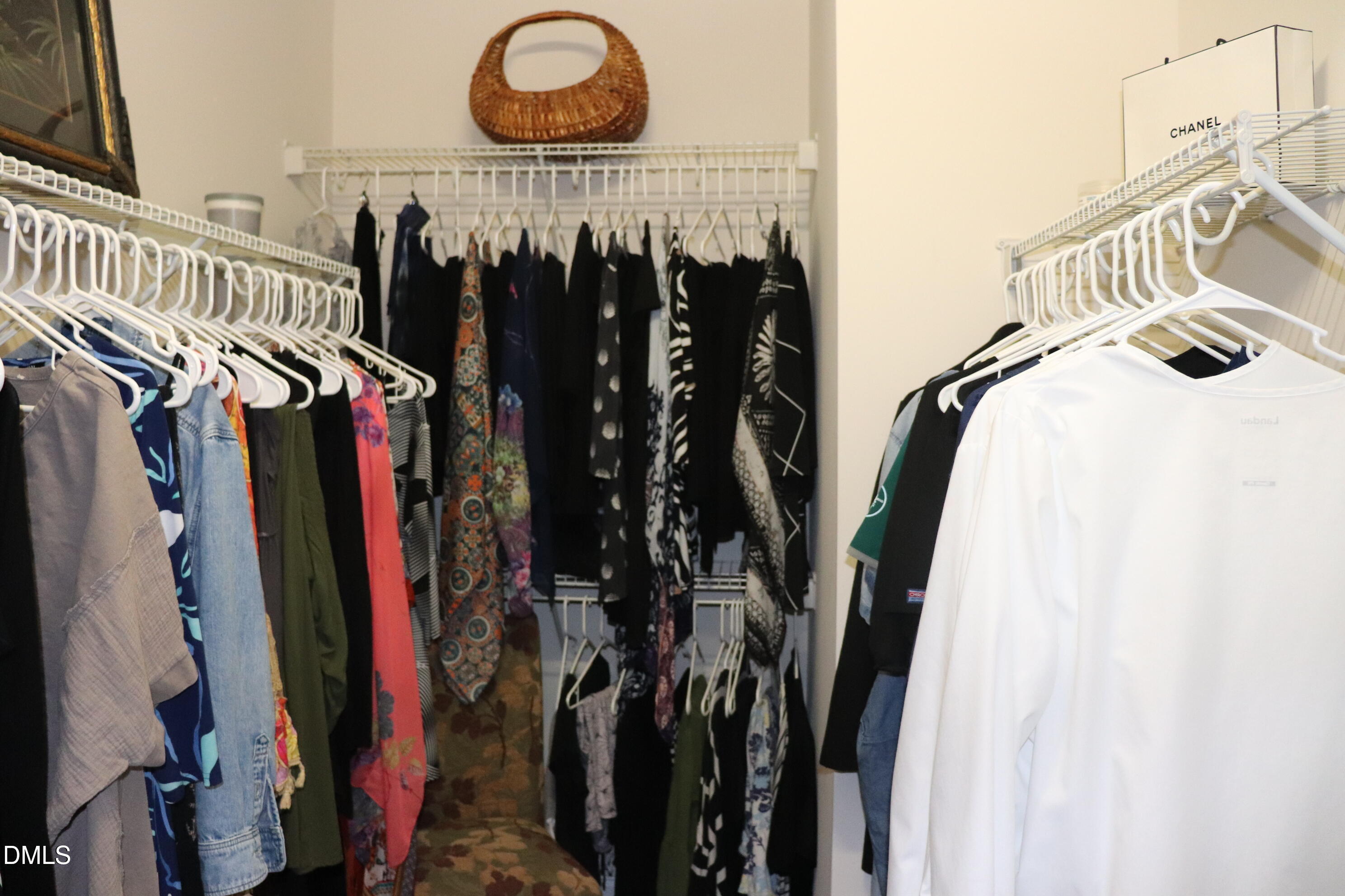 10510 Sablewood Drive, Unit 116 Raleigh, NC 27617 - Photo 24 of 47 a view of walk in closet with clothes and shoes