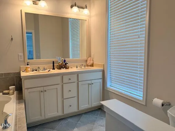 a bathroom with a sink and a bathtub