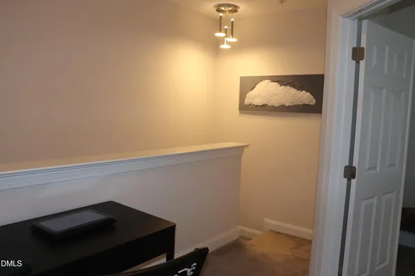 a bathroom with a sink a toilet and shower curtain