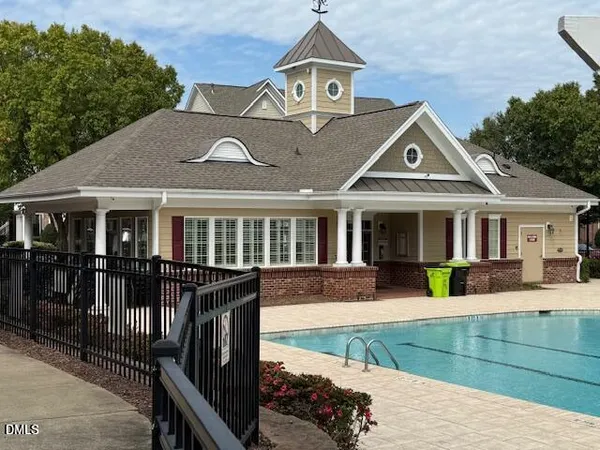 a view of a swimming pool with a patio