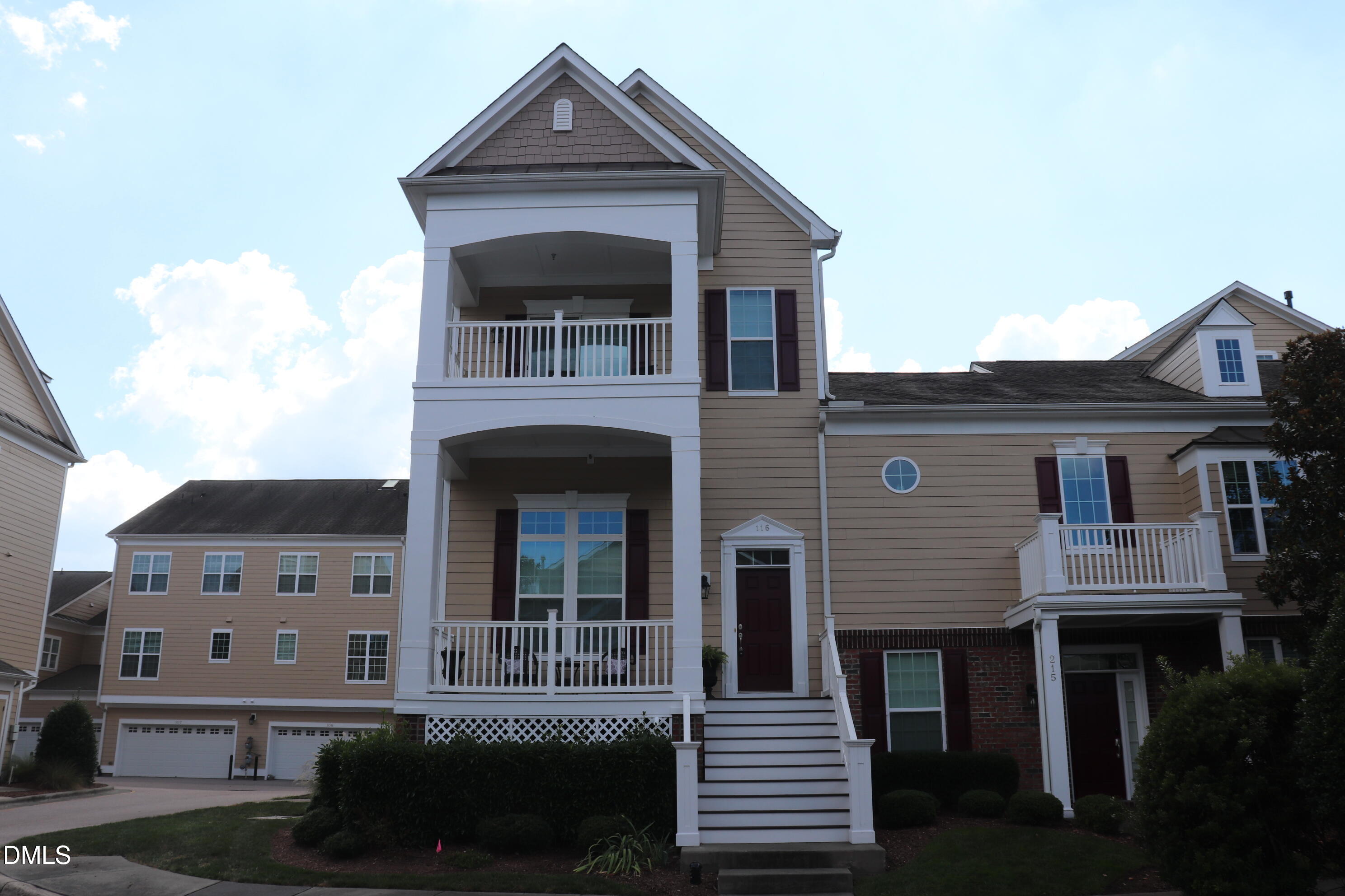 10510 Sablewood Drive, Unit 116 Raleigh, NC 27617 - Photo 5 of 47 a front view of a house with a yard