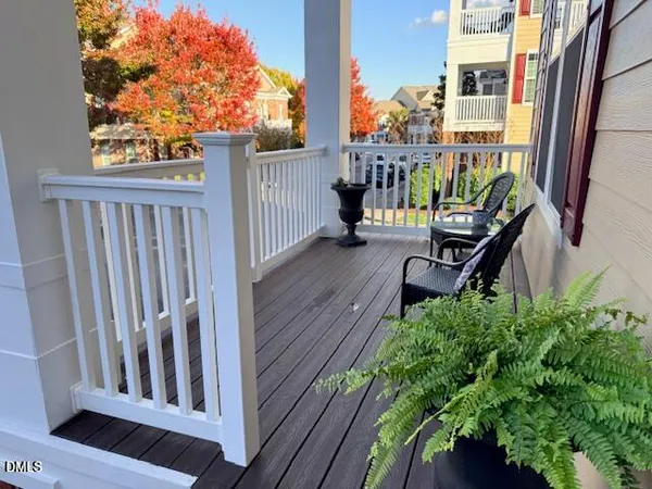 a view of a chairs on the roof deck