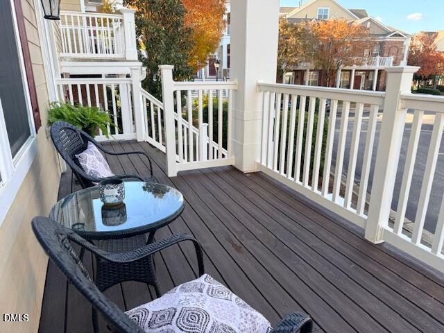 10510 Sablewood Drive, Unit 116 Raleigh, NC 27617 - Photo 9 of 47 a view of a chairs on the roof deck