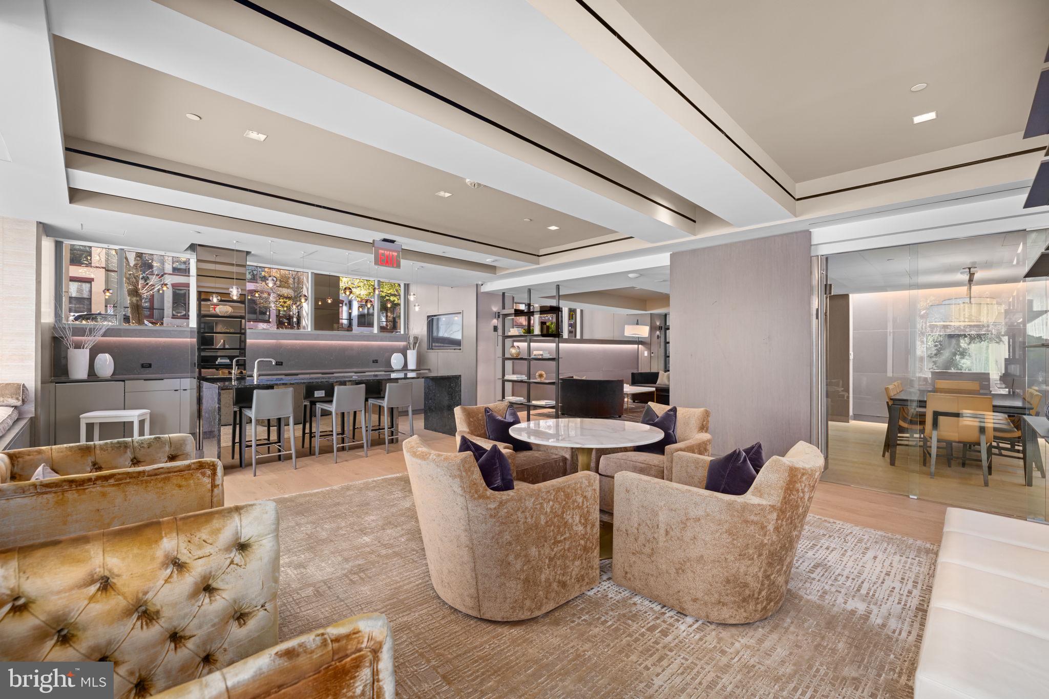 2501 M Street Northwest, Unit T04 Washington, DC 20037 - Photo 23 of 30 a living room with furniture and a large window