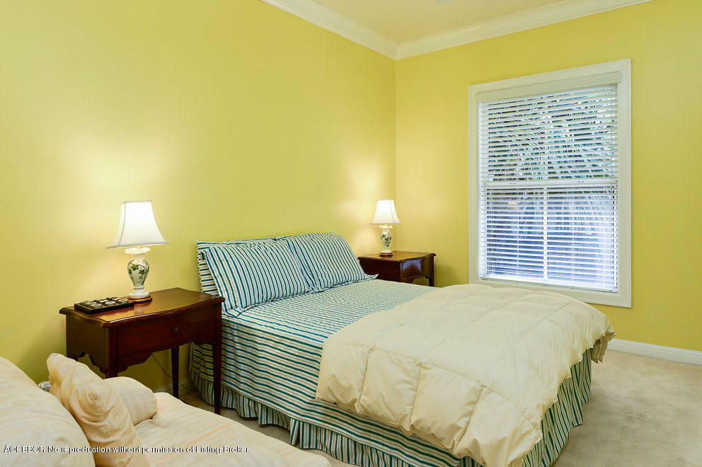 1680 Lands End Road Manalapan, FL 33462 - Photo 14 of 15 a bedroom with a bed and a night stand
