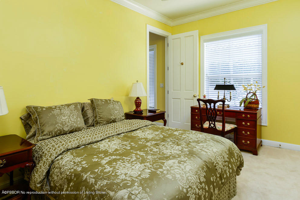 1680 Lands End Road Manalapan, FL 33462 - Photo 15 of 15 a bedroom with a bed and a couch