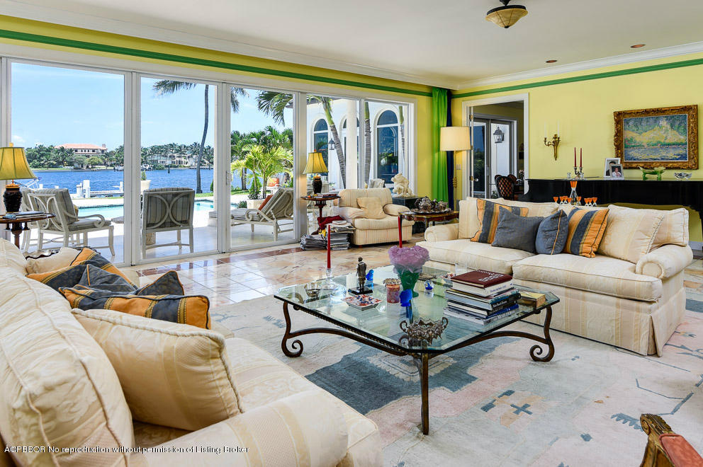 1680 Lands End Road Manalapan, FL 33462 - Photo 7 of 15 a living room with furniture and a large window