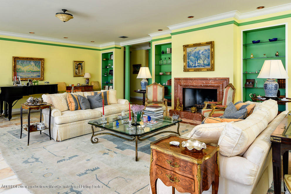 1680 Lands End Road Manalapan, FL 33462 - Photo 8 of 15 a living room with furniture fireplace and a table