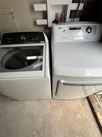 a utility room with dryer and washer