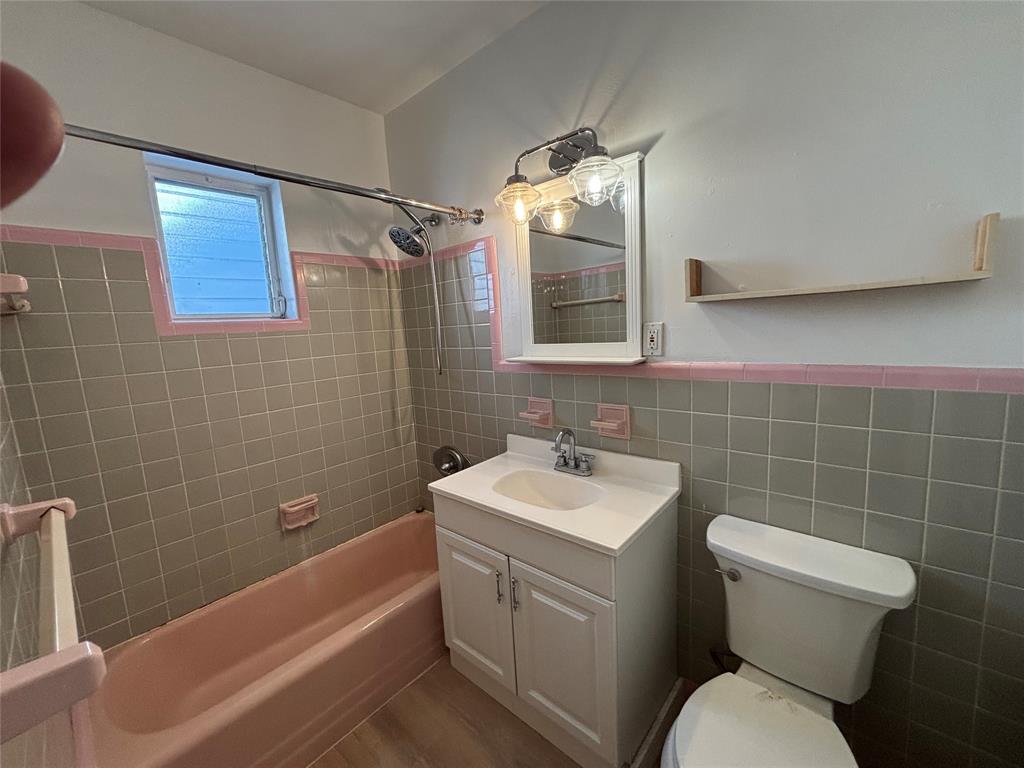 1315 Southeast 2nd Street, Unit REAR EAST Fort Lauderdale, FL 33301 - Photo 7 of 12 a bathroom with a sink a toilet and shower