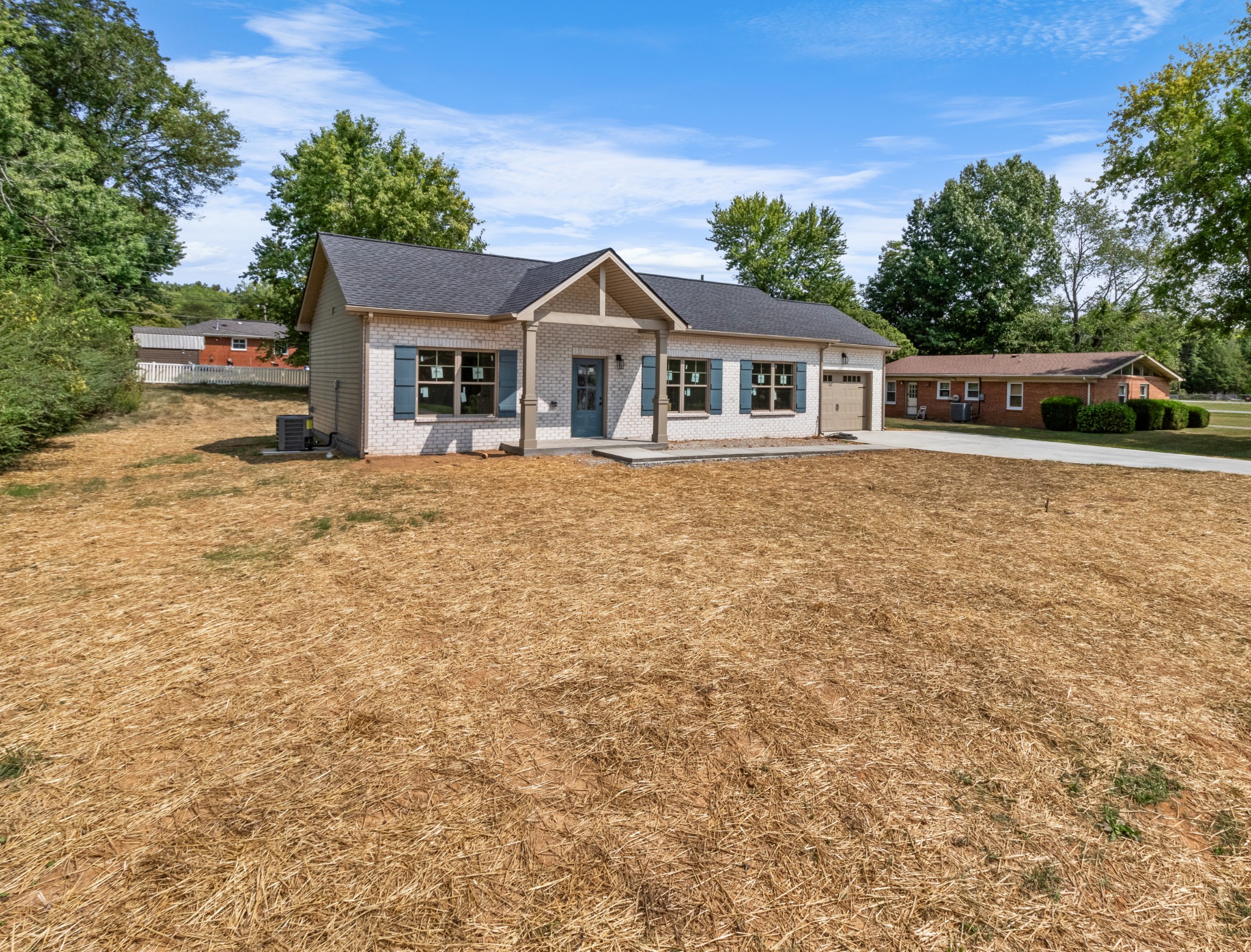 11 Donelson Drive Clarksville, TN 37042 - Photo 2 of 15 a front view of house with yard and trees in the background