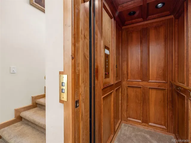 a bathroom with a sink toilet and mirror