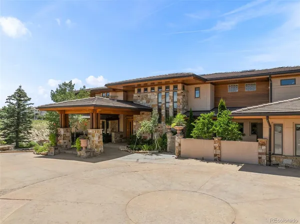 a view of a livingroom with furniture and a fireplace