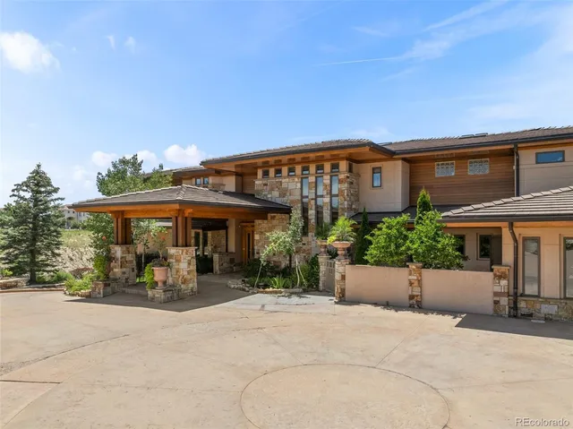 a view of a livingroom with furniture and a fireplace