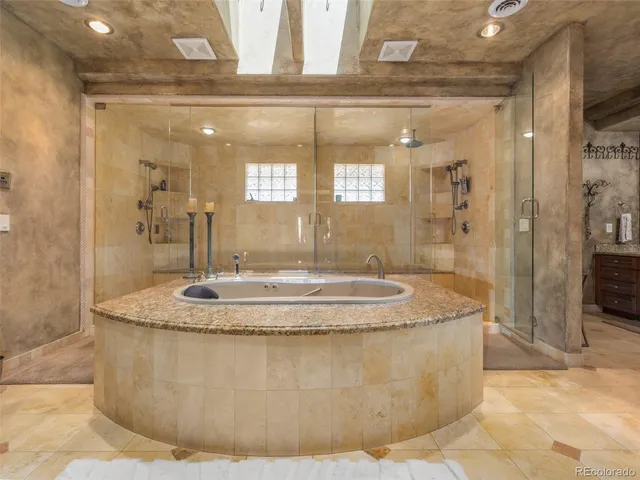 a view of a bathroom with mirror gate