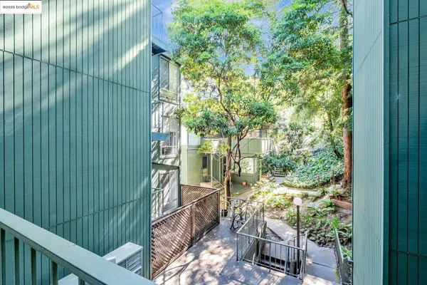a view of balcony with garden