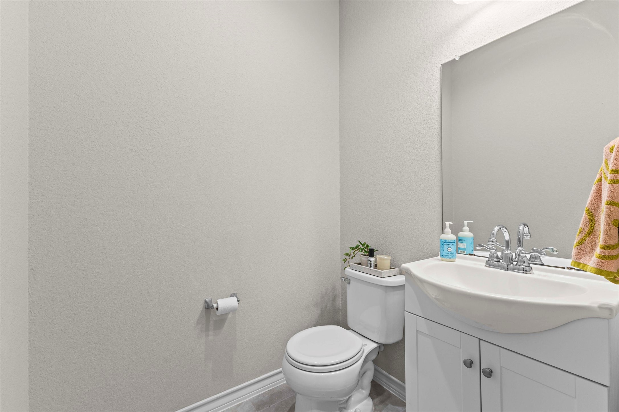 11704 Prado Ranch Boulevard Austin, TX 78725 - Photo 6 of 29 Powder bathroom on first floor