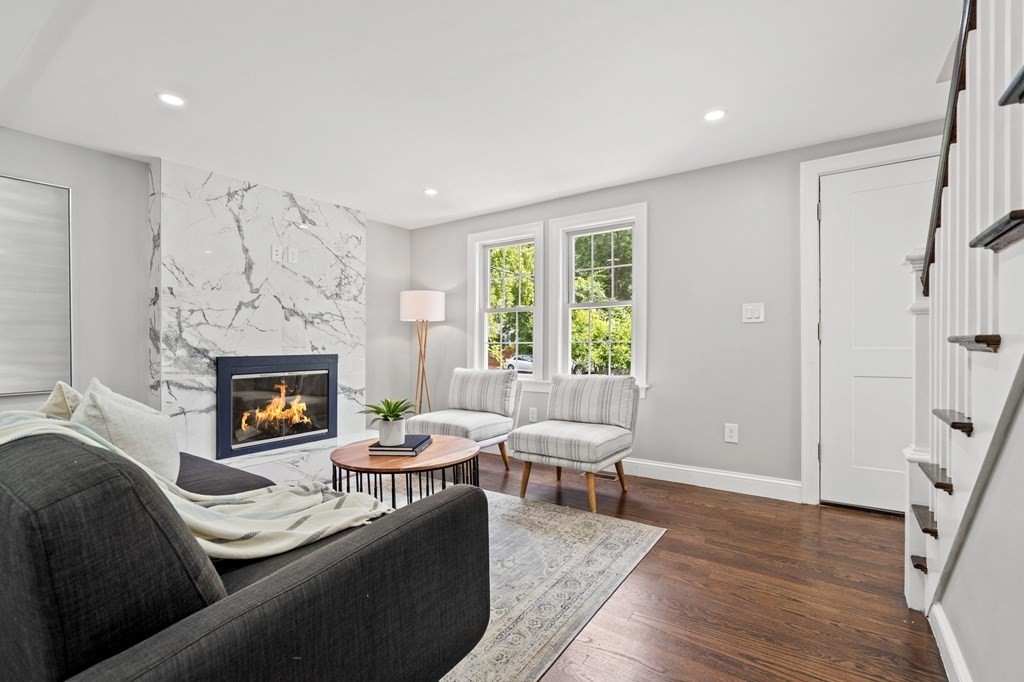 19 Cold Spring Road, Unit S North Reading, MA 01864 - Photo 13 of 30 a living room with furniture and a fireplace
