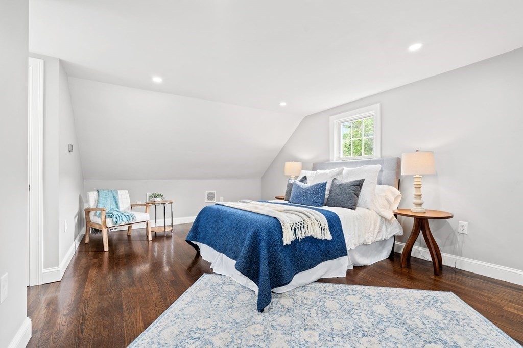 19 Cold Spring Road, Unit S North Reading, MA 01864 - Photo 15 of 30 a bed room with a bed and a chair