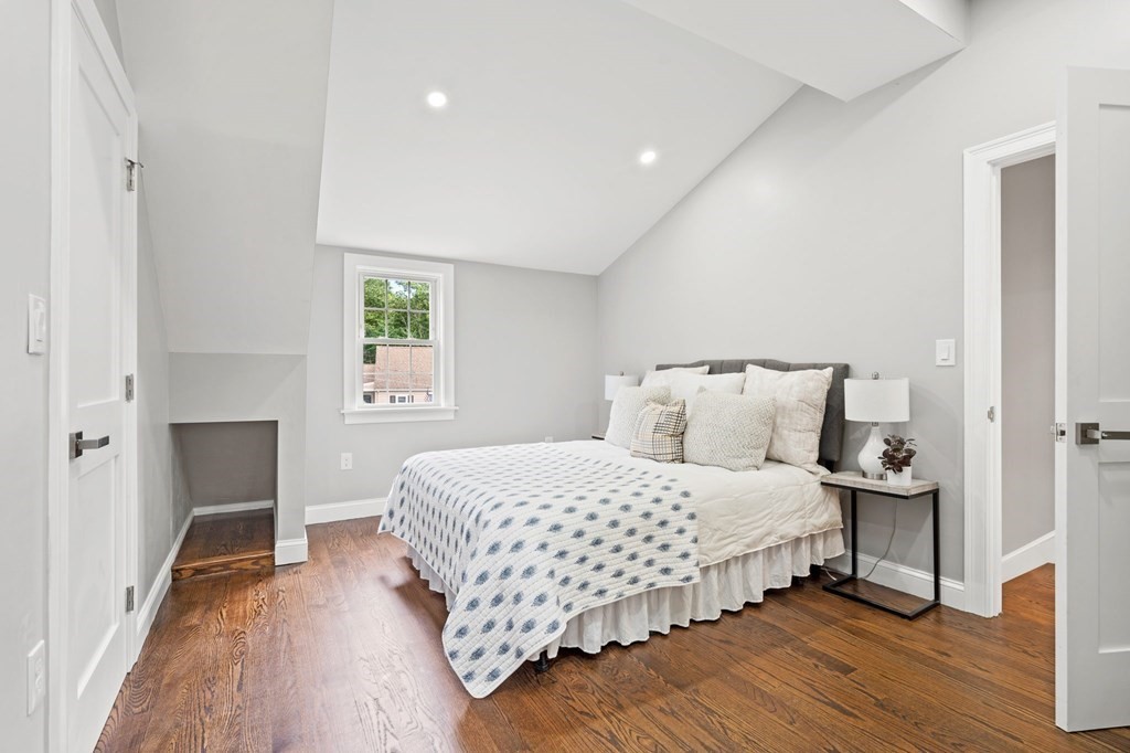 19 Cold Spring Road, Unit S North Reading, MA 01864 - Photo 18 of 30 a bedroom with a bed and a table