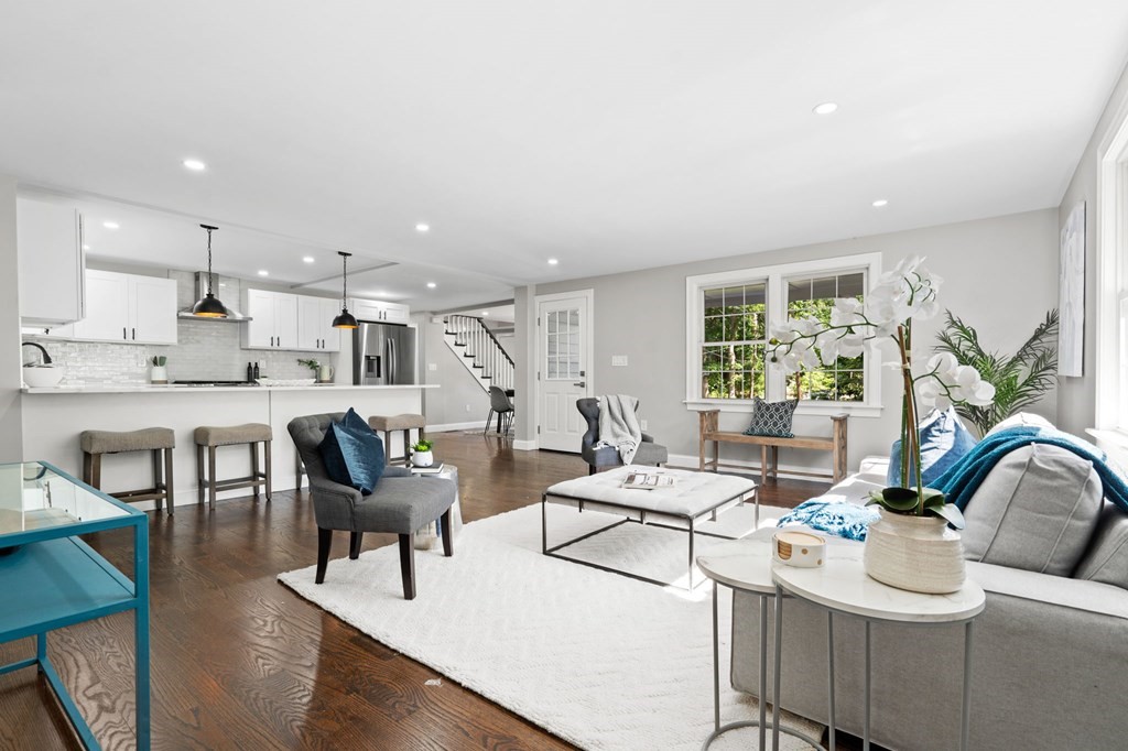19 Cold Spring Road, Unit S North Reading, MA 01864 - Photo 2 of 30 a living room with stainless steel appliances kitchen island granite countertop furniture and a large window