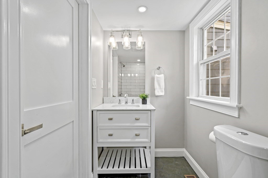 19 Cold Spring Road, Unit S North Reading, MA 01864 - Photo 23 of 30 a bathroom with a granite countertop sink toilet and shower