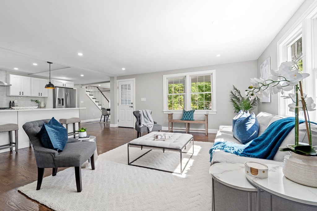 19 Cold Spring Road, Unit S North Reading, MA 01864 - Photo 3 of 30 a living room with furniture and a large window