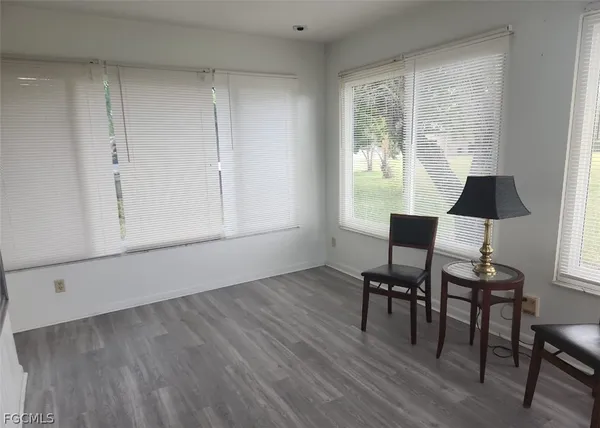 a view of a chairs and table in a room