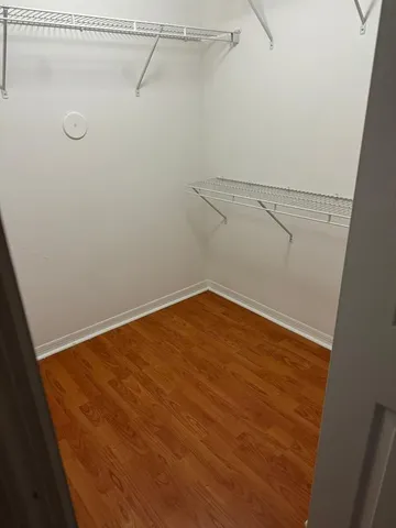 a view of a room with racks on the wall