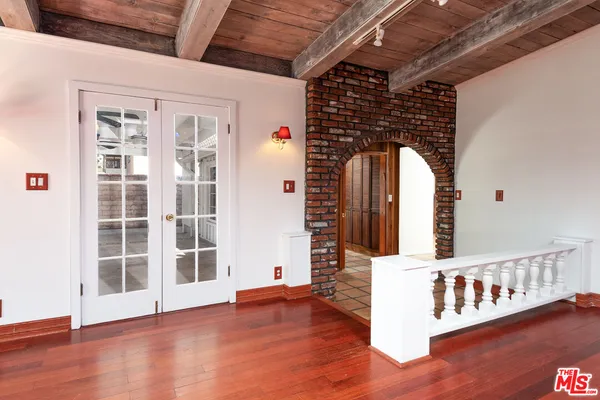 a view of a porch with seating space