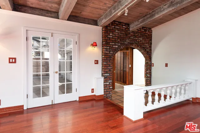 a view of a porch with seating space