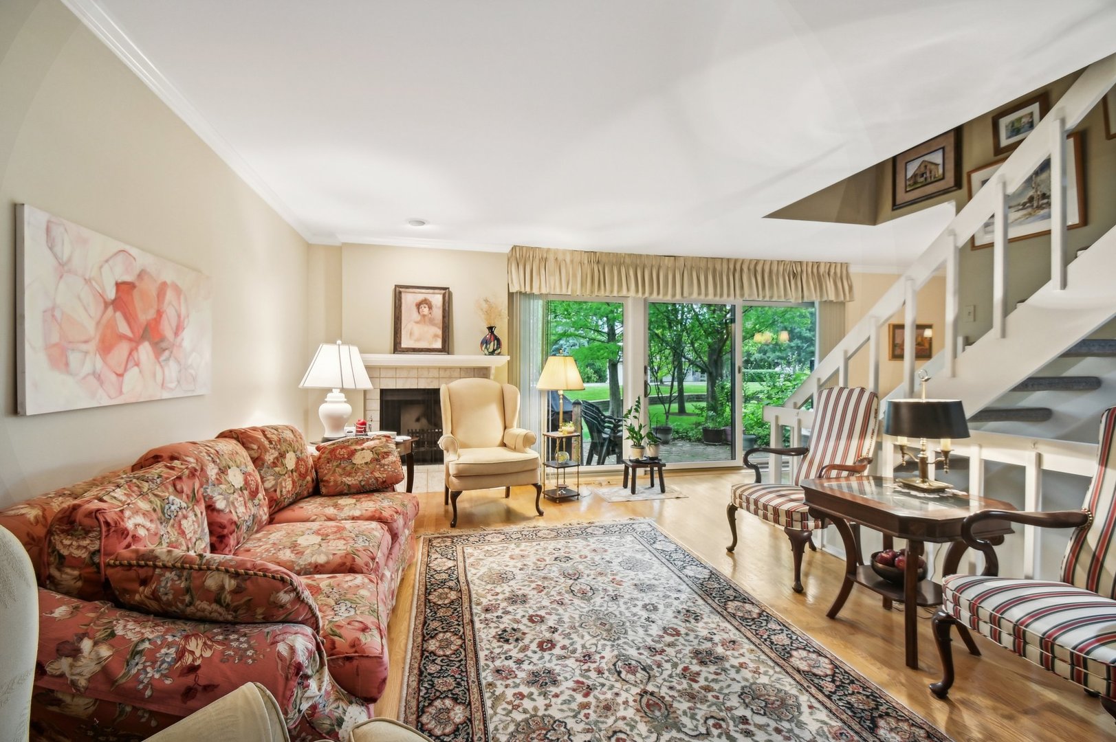 1551 Winnetka Road Glenview, IL 60025 - Photo 2 of 28 a living room with furniture large window and a fireplace