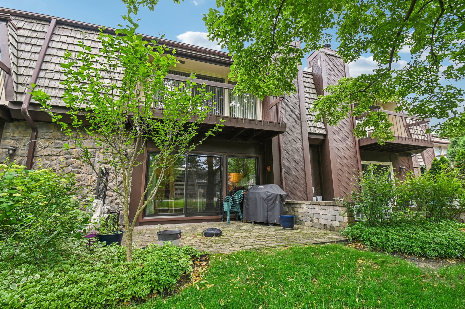 1551 Winnetka Road Glenview, IL 60025 - Photo 23 of 28 a view of a house with a yard and plants