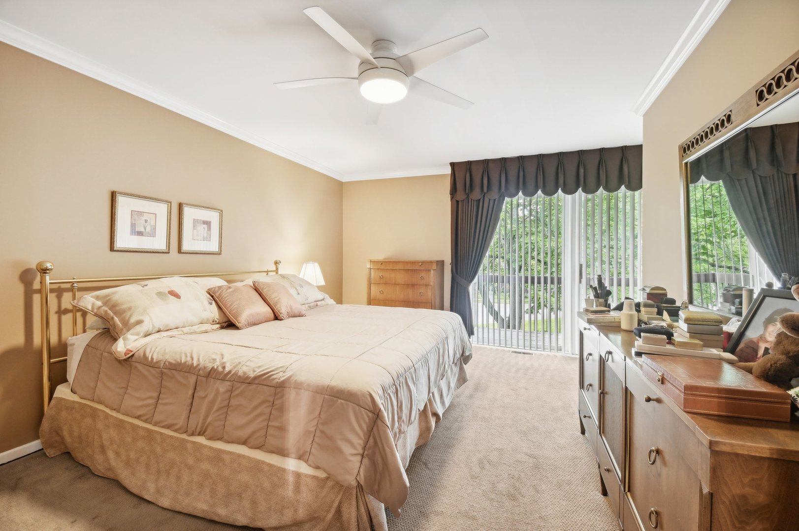 1551 Winnetka Road Glenview, IL 60025 - Photo 8 of 28 a bedroom with a balcony a bed and a couch