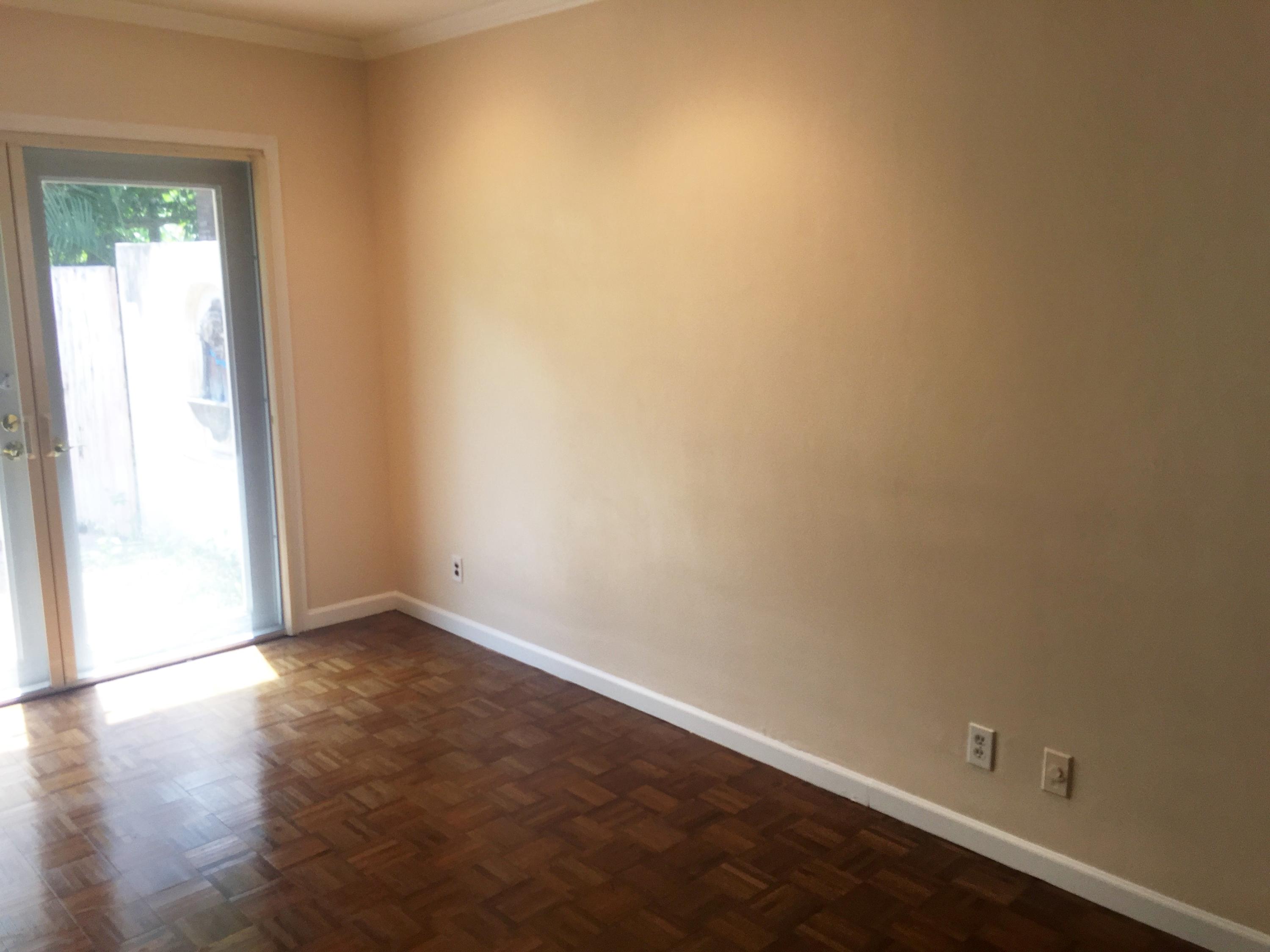 1200 Southwest 15th Street Boca Raton, FL 33486 - Photo 16 of 18 an empty room with wooden floor and windows