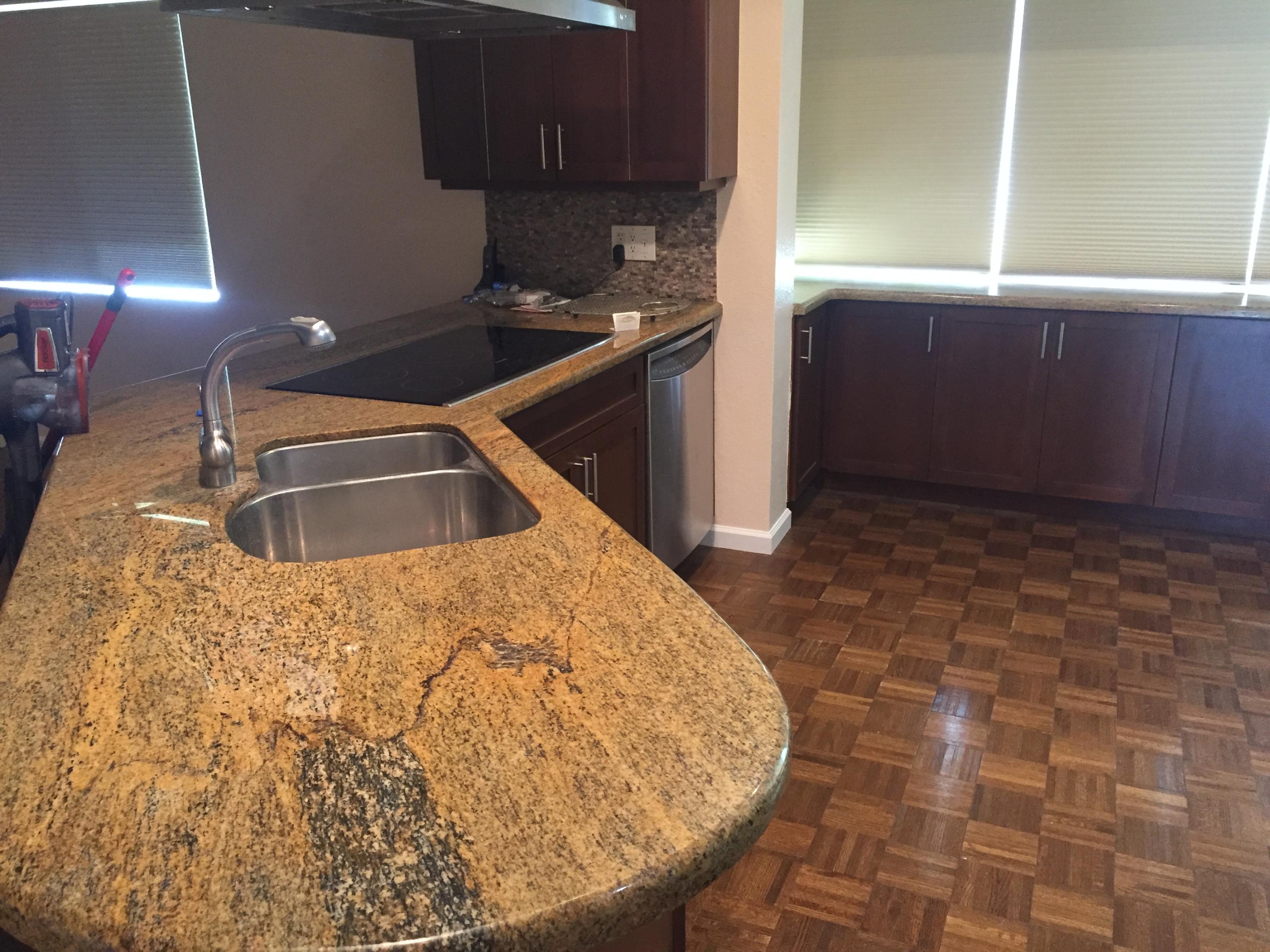 1200 Southwest 15th Street Boca Raton, FL 33486 - Photo 3 of 18 a room with a wooden floor and cabinets
