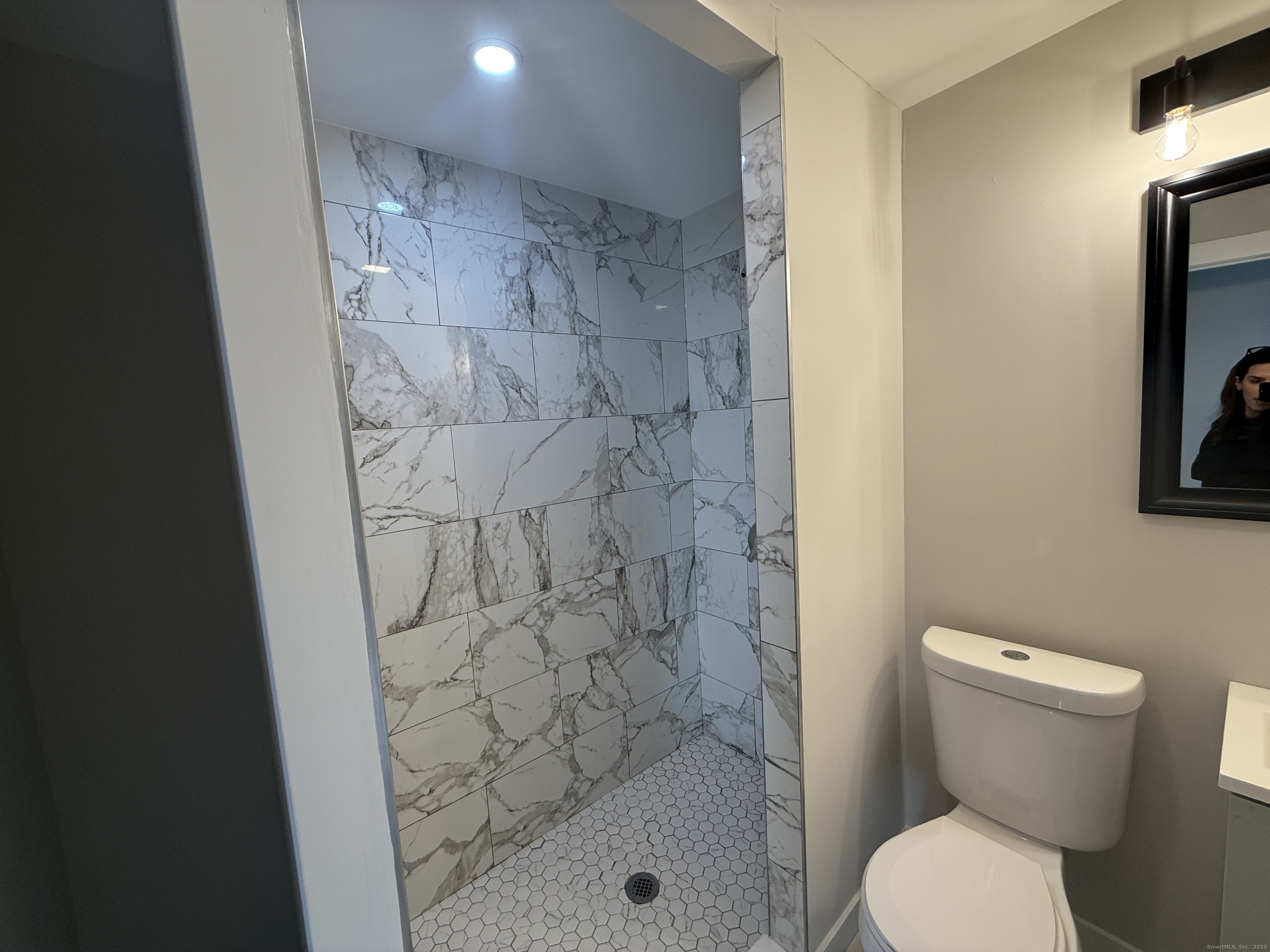 55 Ownly Avenue West Haven, CT 06516 - Photo 6 of 16 a bathroom with a toilet and a shower