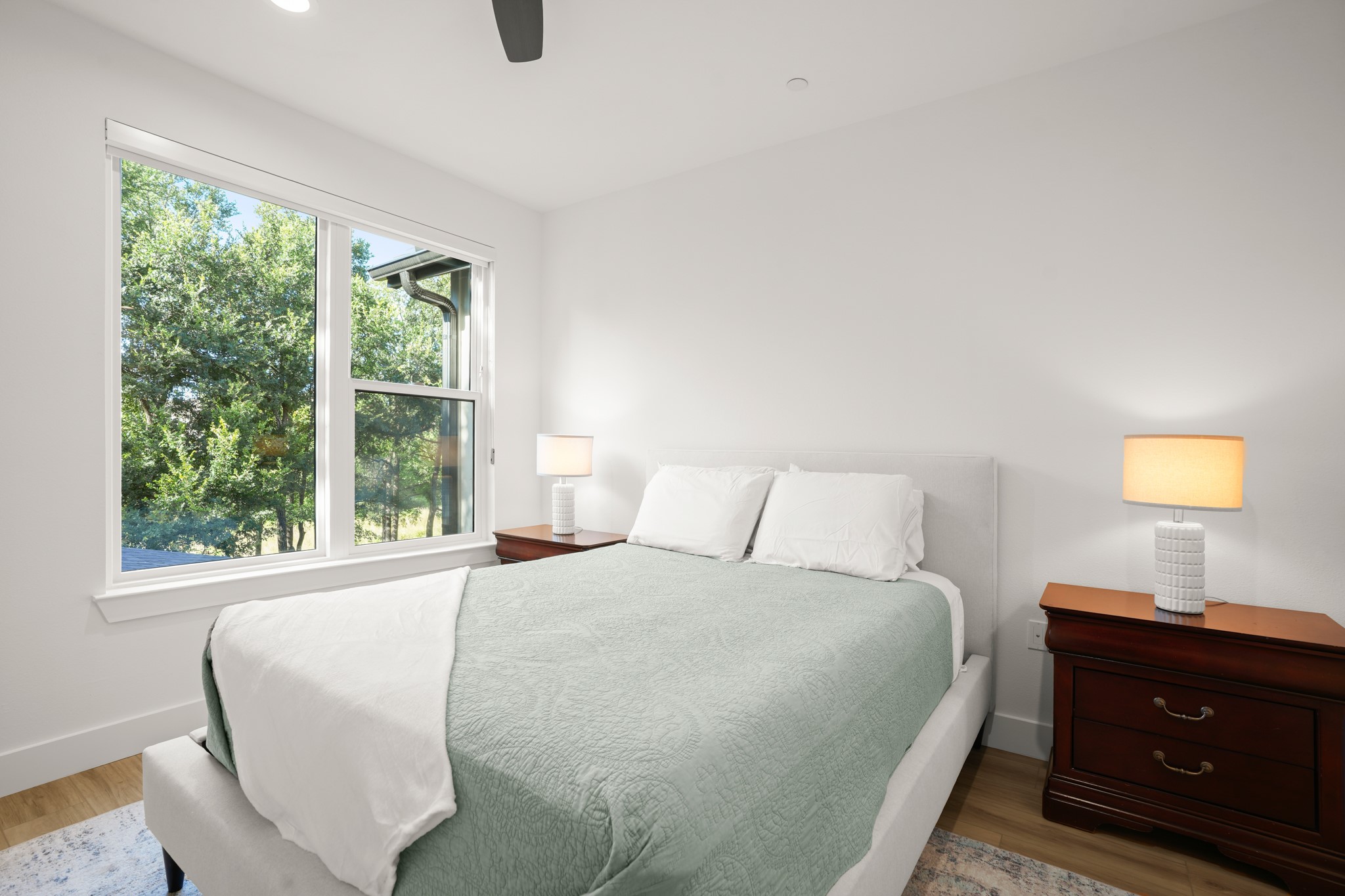 595 Old Mill Road, Unit 206 Cedar Park, TX 78613 - Photo 22 of 39 The junior suite boasts gorgeous tree top views through a large picture window.