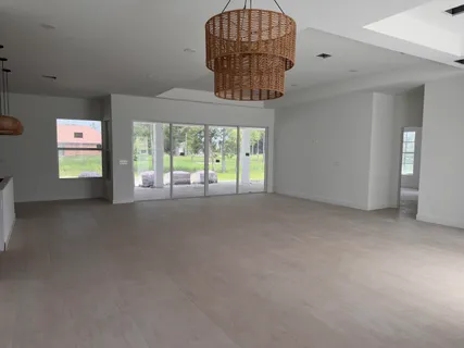 en empty room with windows