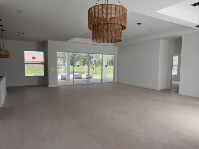 en empty room with windows