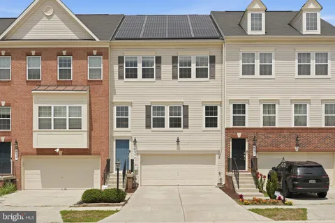 a front view of a house with outdoor space