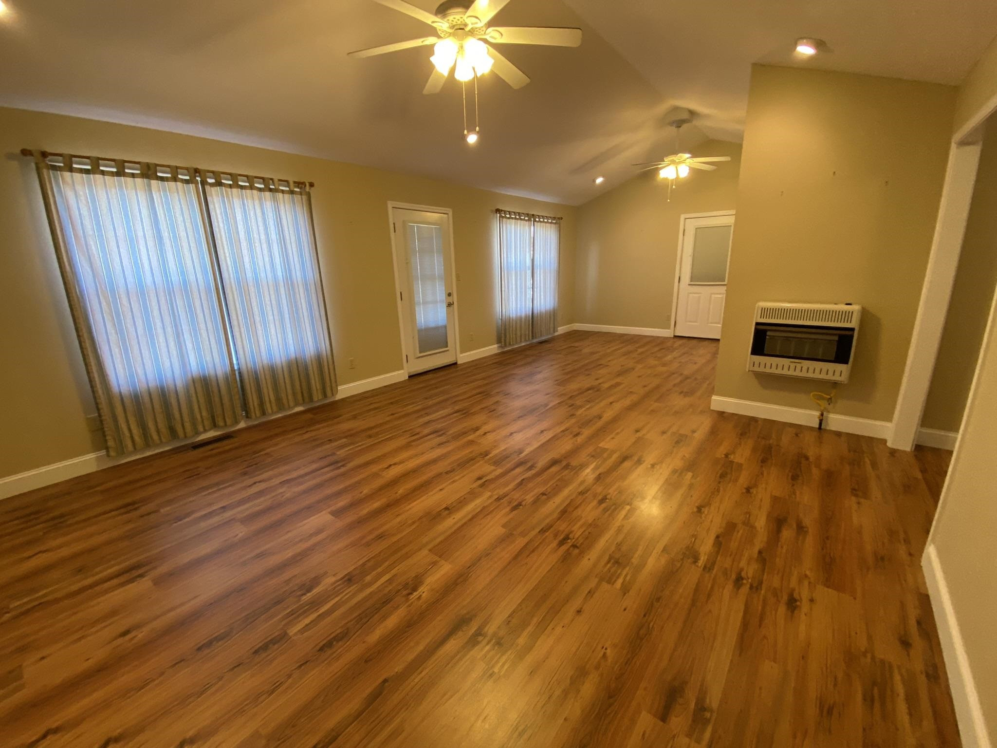 480 Enville Road Henderson, TN 38340 - Photo 18 of 35 wooden floor in an empty room with a window
