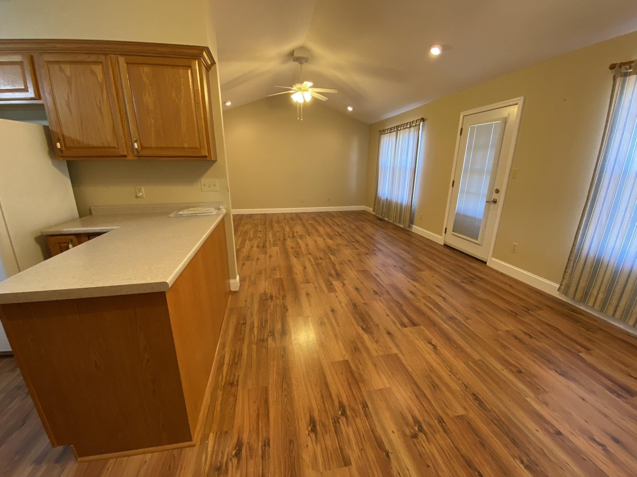480 Enville Road Henderson, TN 38340 - Photo 26 of 35 a view of an empty room with wooden floor and a window