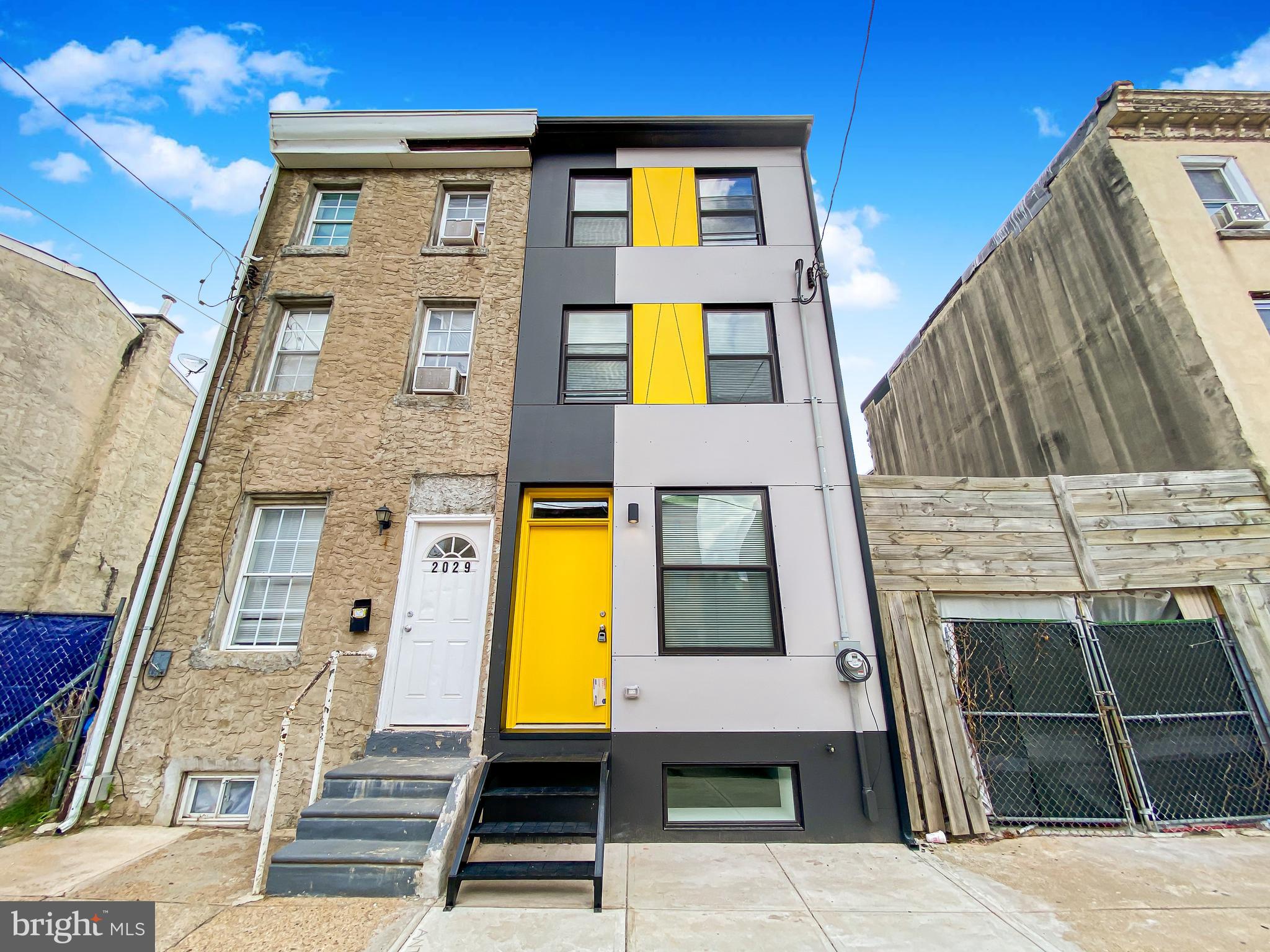 a front view of a house with a swimming pool