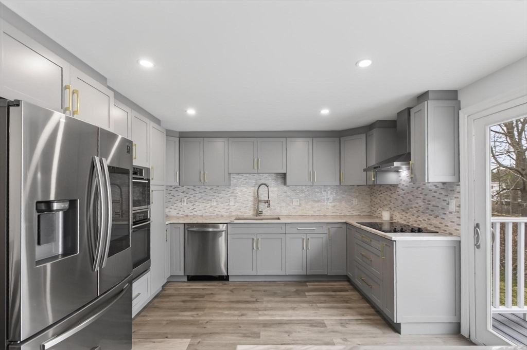 15 Cedar Square, Unit 15 Millis, MA 02054 - Photo 1 of 42 a kitchen with stainless steel appliances granite countertop a refrigerator sink and cabinets