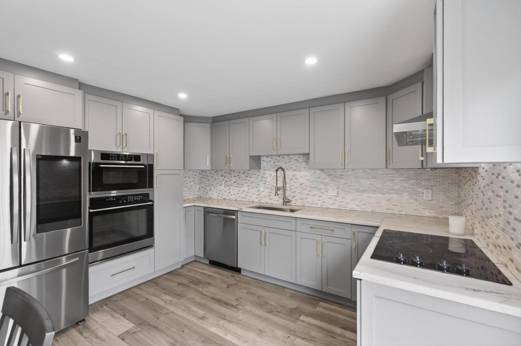 15 Cedar Square, Unit 15 Millis, MA 02054 - Photo 15 of 42 a kitchen with a sink stove and refrigerator