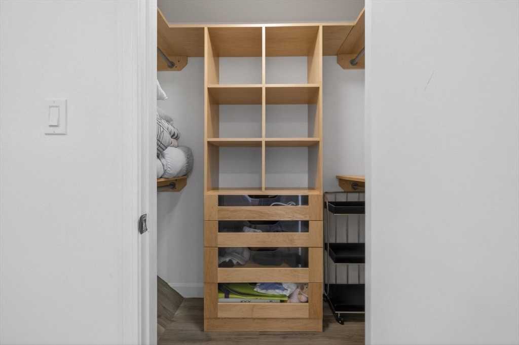 15 Cedar Square, Unit 15 Millis, MA 02054 - Photo 23 of 42 a view of walk in closet with empty racks