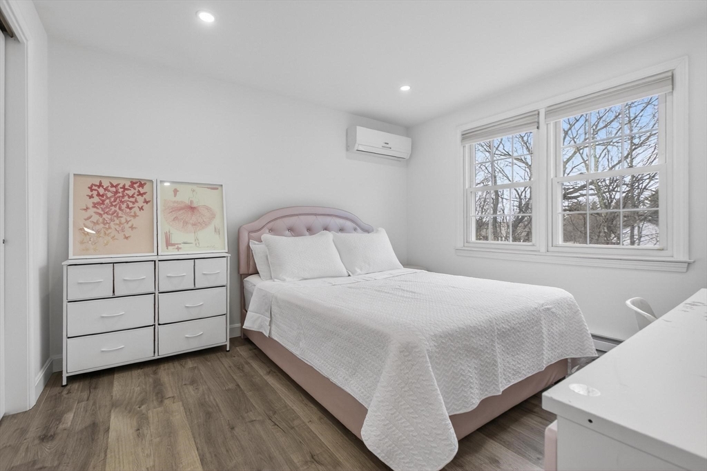 15 Cedar Square, Unit 15 Millis, MA 02054 - Photo 24 of 42 a bedroom with a bed and a window
