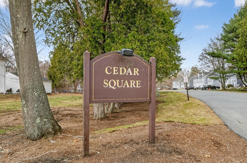 15 Cedar Square, Unit 15 Millis, MA 02054 - Photo 37 of 42 a sign board with a yard