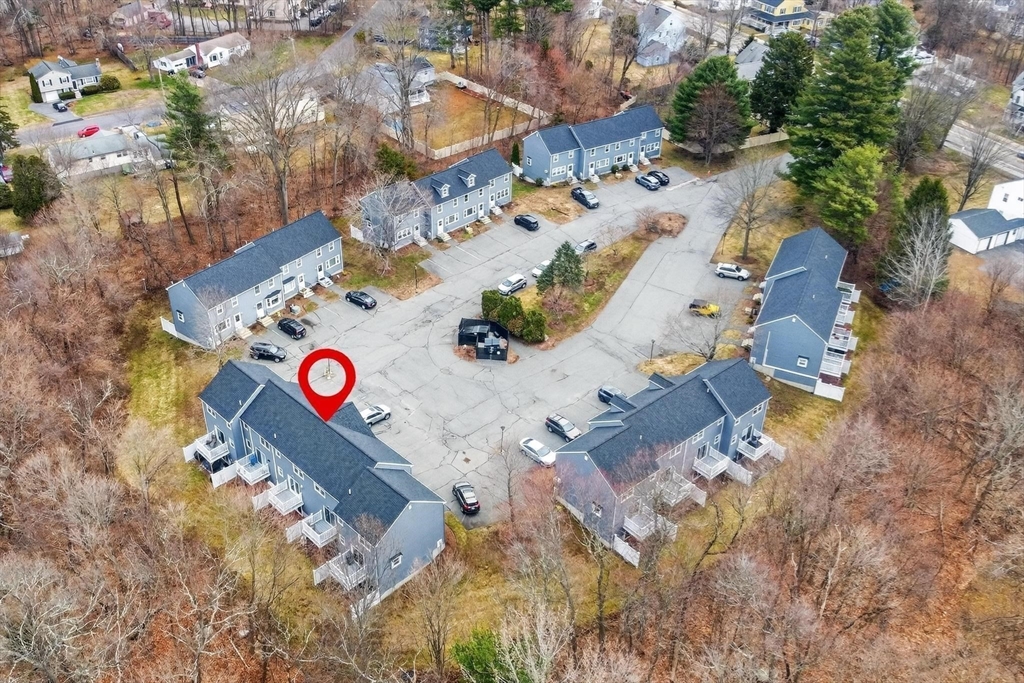 15 Cedar Square, Unit 15 Millis, MA 02054 - Photo 39 of 42 an aerial view of a swimming pool and outdoor space